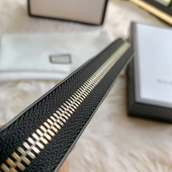 G*u*i leather zip around wallet