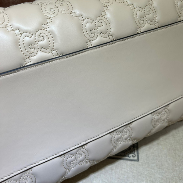 G*u*i gg matelassé leather top handle bag