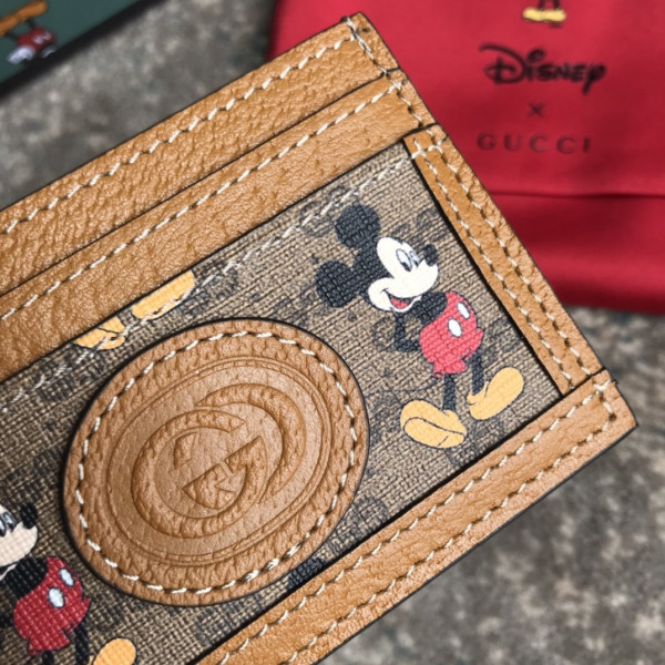 disney x G*u*i gg card holder