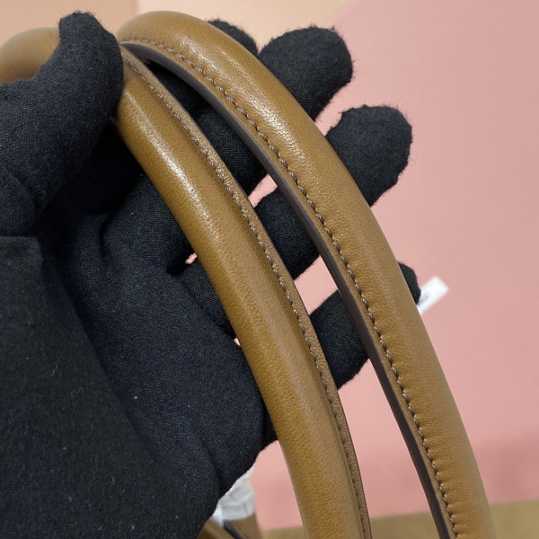 M*um*u aventure nappa leather bag